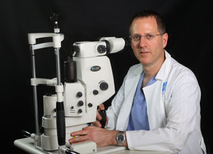 Prof. Eitan Blumenthal and one of the laser devices